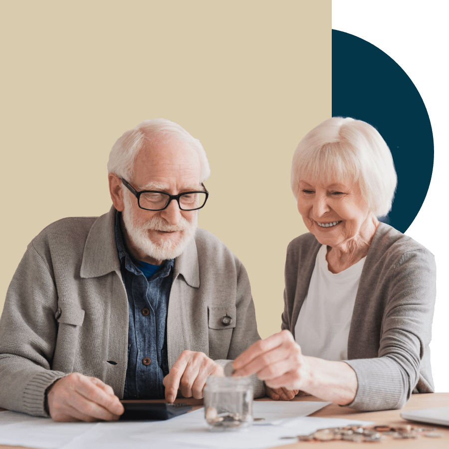 older couple putting money into coinbox